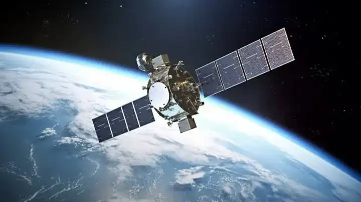 High-tech satellite with solar panels orbiting above Earth’s atmosphere.